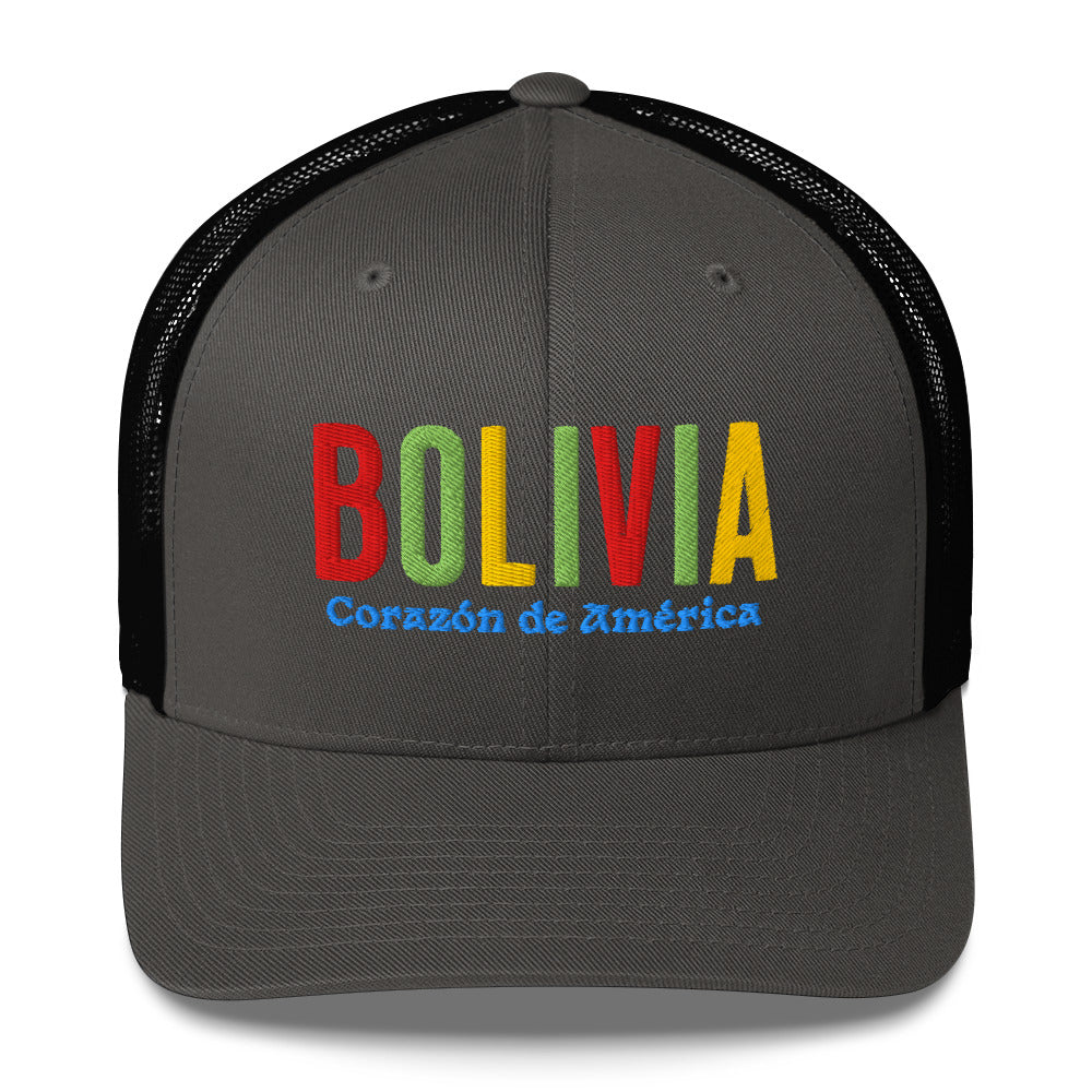 Gorra bordada con frase “Corazón de América”, diseño cultural boliviano con raíces andinas.