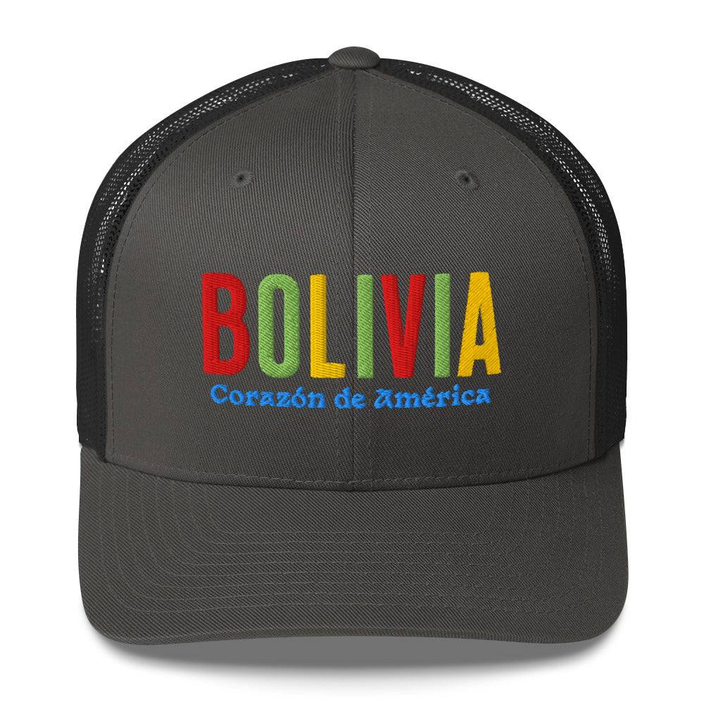 Gorra bordada con frase “Corazón de América”, diseño cultural boliviano con raíces andinas.