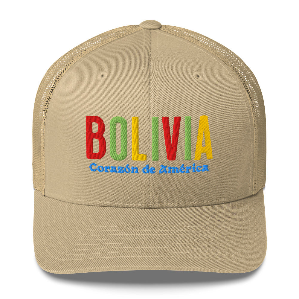 Gorra bordada con frase “Corazón de América”, diseño cultural boliviano con raíces andinas.