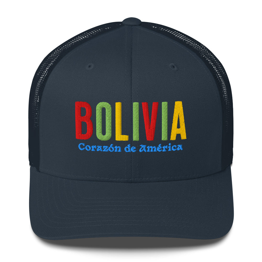 Gorra bordada con frase “Corazón de América”, diseño cultural boliviano con raíces andinas.