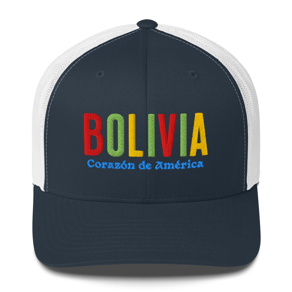 Gorra bordada con frase “Corazón de América”, diseño cultural boliviano con raíces andinas.