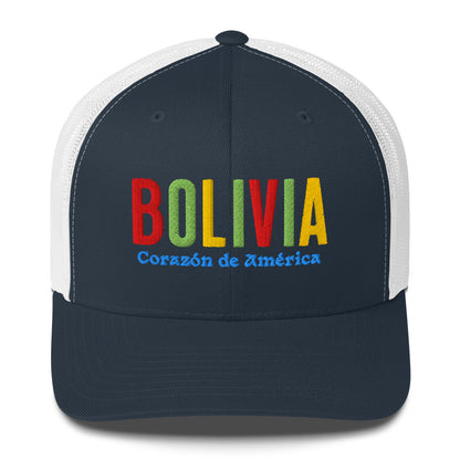 Gorra bordada con frase “Corazón de América”, diseño cultural boliviano con raíces andinas.