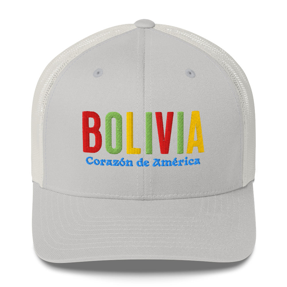 Gorra bordada con frase “Corazón de América”, diseño cultural boliviano con raíces andinas.