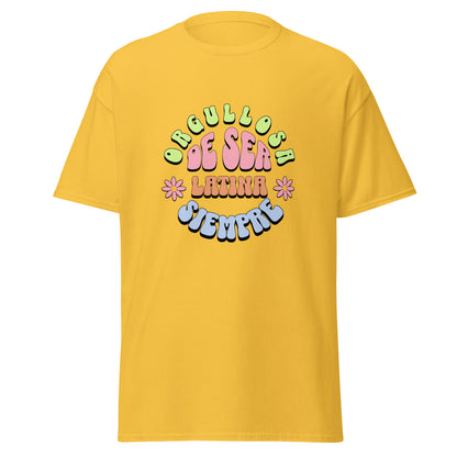 Retro groovy t-shirt design featuring "ORGULLOSA DE SER LATINA SIEMPRE" in curved bubble letters - lime green for "ORGULLOSA", soft pink for "DE SER", coral orange for "LATINA", and sky blue for "SIEMPRE", decorated with pink daisy flowers with yellow centers on both sides